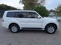 2014 Mitsubishi Pajero IV Рестайлинг 1, белый, 2100000 рублей - вид 2