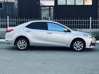 2016 Toyota Corolla XI (E160, E170, E180) Рестайлинг 1, серебристый, 1470000 рублей, вид 3