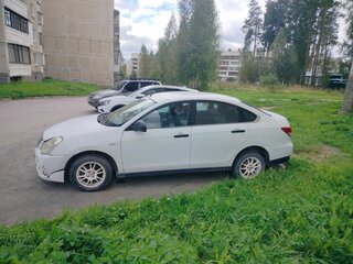 2014 Nissan Almera III (G15), белый, 390000 рублей, вид 2