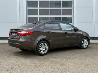 2014 Kia Rio 6-speed III, коричневый, 723000 рублей, вид 5