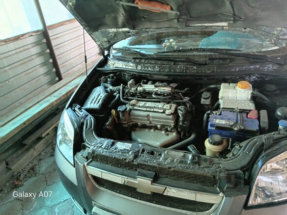 2010 Chevrolet Aveo I Рестайлинг, серый, 430000 рублей - вид 10