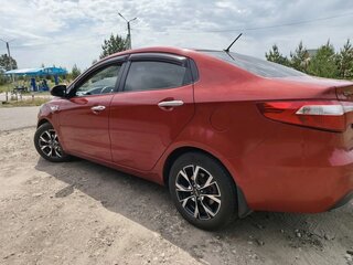 2011 Kia Rio 5-speed III, красный, 750000 рублей, вид 5