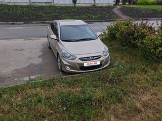 2011 Hyundai Solaris I, золотистый, 729000 рублей, вид 2