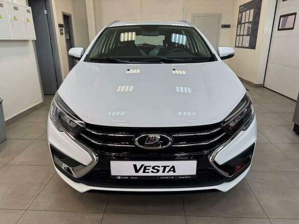 2026 Lada (ВАЗ) Vesta SW I Рестайлинг (NG), белый, 1809000 рублей - вид 1