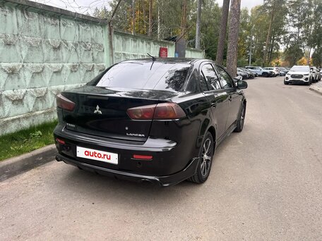 2008 Mitsubishi Lancer X, чёрный, 430000 рублей, вид 4