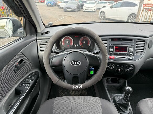 2011 Kia Rio II Рестайлинг, серебристый, 549000 рублей - вид 14