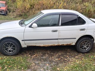 2001 Nissan Sunny B15, белый, 210000 рублей, вид 1