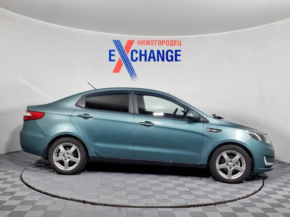 2011 Kia Rio 4-speed III, зелёный - вид 8