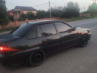 2011 Daewoo Nexia I Рестайлинг, чёрный, 90000 рублей, вид 2