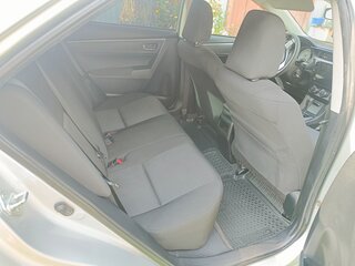 2013 Toyota Corolla XI (E160, E170, E180), серебристый, 1250000 рублей, вид 2
