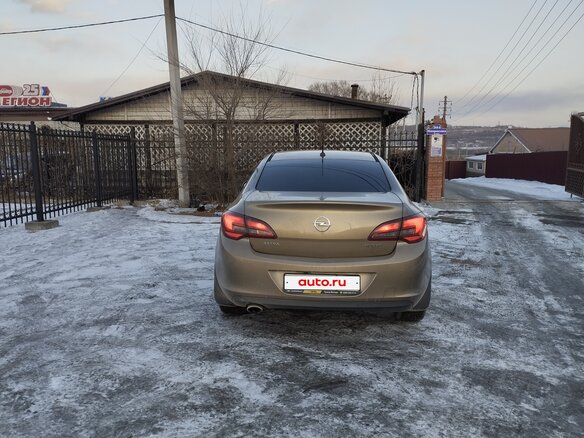 2013 Opel Astra J Рестайлинг, бежевый - вид 1