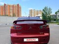 2008 Mitsubishi Lancer X, красный - вид 1