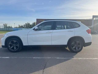 2013 BMW X1 18i I (E84) Рестайлинг, белый, 1100000 рублей, вид 1