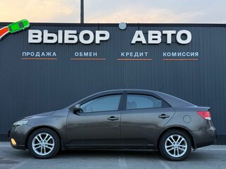 2010 Kia Cerato 6-speed II, коричневый, 749000 рублей, вид 4