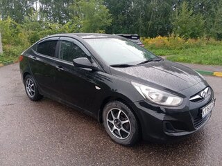 2012 Hyundai Solaris I, чёрный, 700000 рублей, вид 3