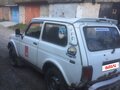 1999 Lada (ВАЗ) 2121 (4x4) I Рестайлинг, белый, 140000 рублей - вид 1