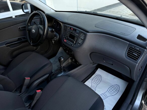2010 Kia Rio II Рестайлинг, серебристый - вид 13
