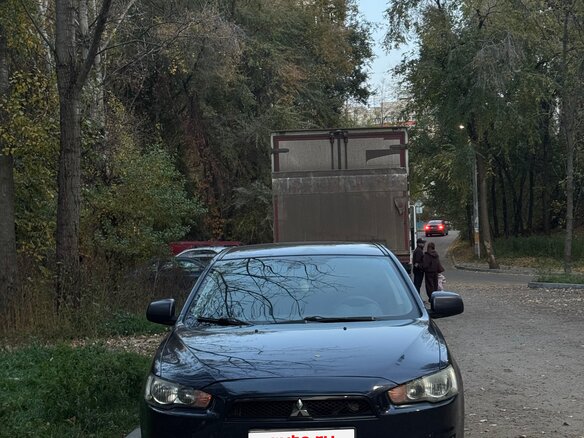 2008 Mitsubishi Lancer X, синий, 900000 рублей - вид 2