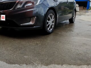 2012 Kia Rio 4-speed III, серый, 700000 рублей, вид 1