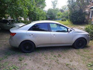 2010 Kia Cerato 5-speed II, серебристый, 840000 рублей, вид 2