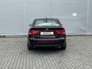 2011 Kia Cerato 6-speed II, красный, 530000 рублей, вид 5
