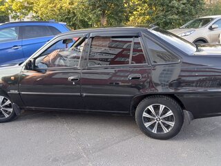2012 Daewoo Nexia I Рестайлинг, чёрный, 175000 рублей, вид 2