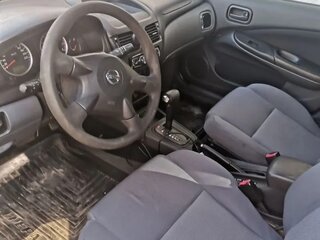 2005 Nissan Almera II (N16) Рестайлинг, серебристый, 250000 рублей, вид 4