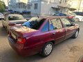 2010 Daewoo Nexia I Рестайлинг, красный - вид 2