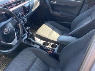 2014 Toyota Corolla XI (E160, E170, E180), серебристый, 930000 рублей, вид 5