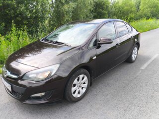 2014 Opel Astra J Рестайлинг, коричневый, 750000 рублей, вид 1