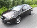 2014 Opel Astra J Рестайлинг, коричневый, 750000 рублей