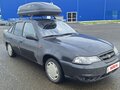 2010 Daewoo Nexia I Рестайлинг, чёрный, 260000 рублей
