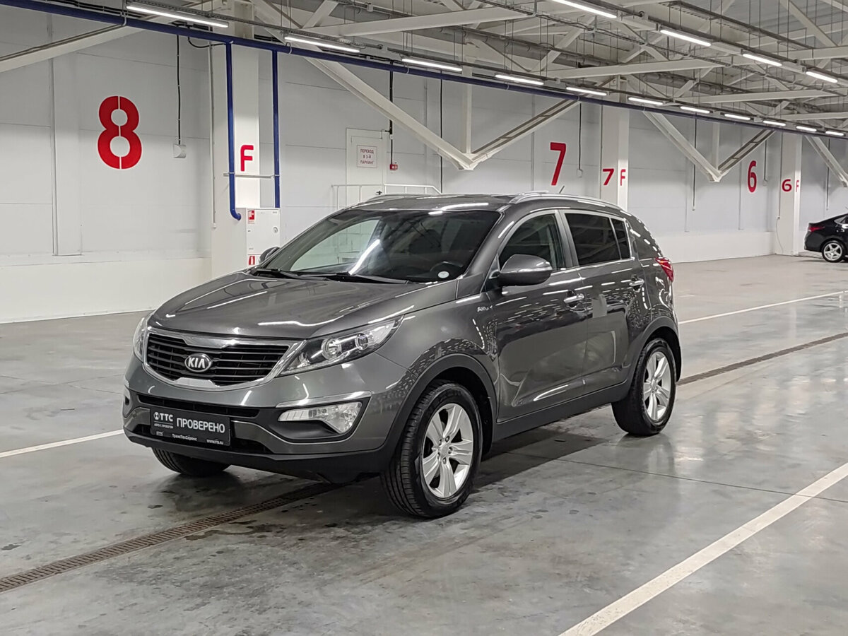 Открыть фотографии: Kia Sportage III