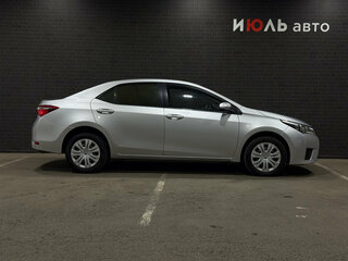 2014 Toyota Corolla XI (E160, E170, E180), серебристый, 1290000 рублей, вид 4