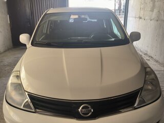 2011 Nissan Tiida I Рестайлинг, белый, 750000 рублей, вид 1