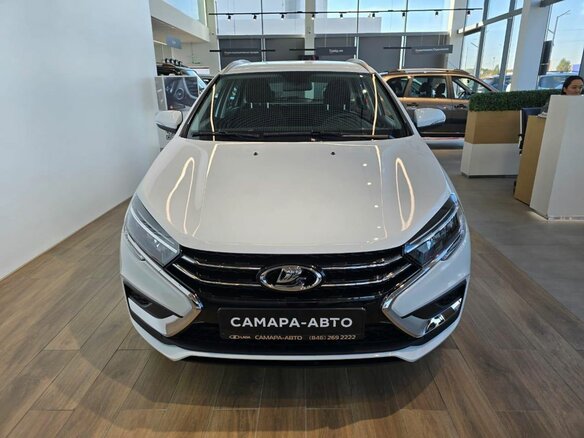 2026 Lada (ВАЗ) Vesta SW I Рестайлинг (NG), белый, 1815000 рублей - вид 1