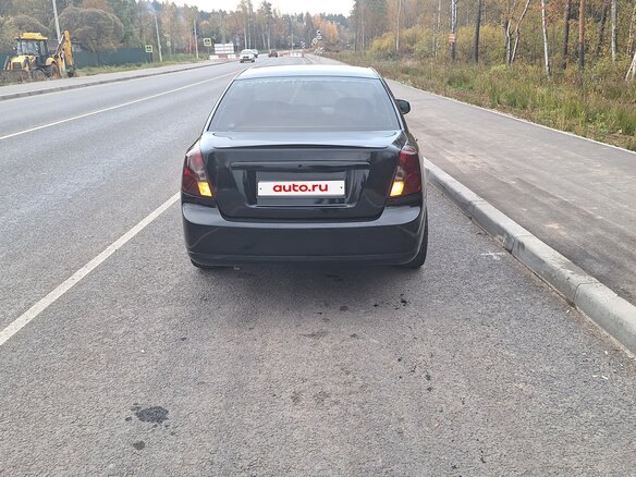 2013 Daewoo Gentra II, чёрный - вид 2