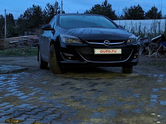 2013 Opel Astra J Рестайлинг, чёрный, 750000 рублей - вид 1