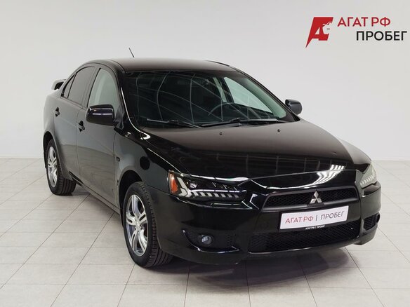 2010 Mitsubishi Lancer X, чёрный, 750000 рублей - вид 2