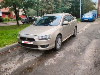 2007 Mitsubishi Lancer X, золотистый, 535000 рублей, вид 1