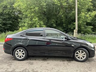 2013 Hyundai Solaris I, чёрный, 690000 рублей, вид 3