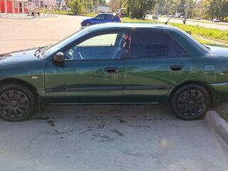 2000 Mitsubishi Carisma I Рестайлинг, зелёный, 320000 рублей, вид 5