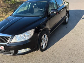 2012 Skoda Octavia II (A5) Рестайлинг, чёрный, 990000 рублей, вид 1