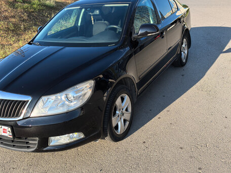 2012 Skoda Octavia II (A5) Рестайлинг, чёрный, 990000 рублей, вид 1