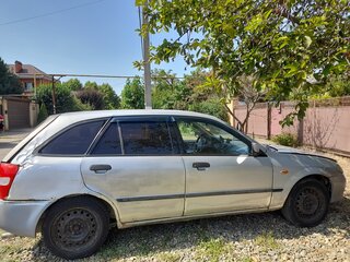 1999 Mazda 323 VI (BJ), серебристый, 110000 рублей, вид 5