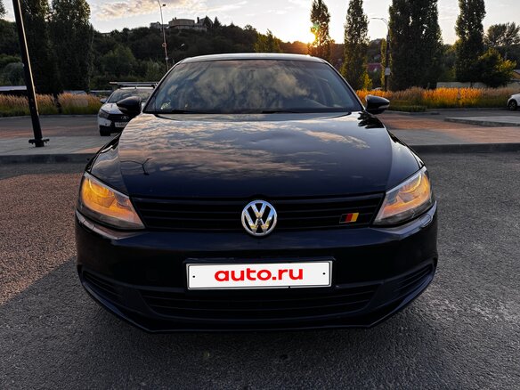 2013 Volkswagen Jetta VI, чёрный - вид 2