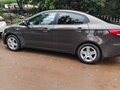 2016 Kia Rio III Рестайлинг, коричневый, 1019000 рублей
