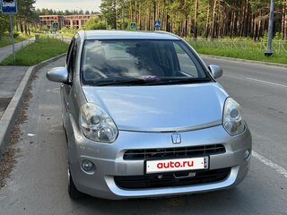 2010 Toyota Passo II (C30), серебристый, 545000 рублей, вид 2