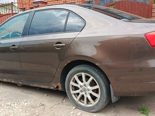2011 Volkswagen Jetta VI, коричневый, 700000 рублей, вид 4