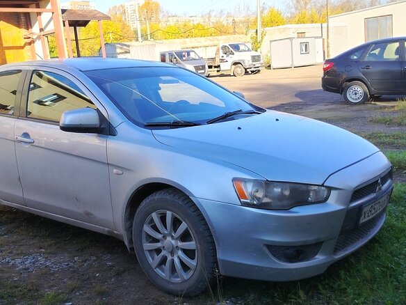 2010 Mitsubishi Lancer X, серебристый, 720000 рублей - вид 1